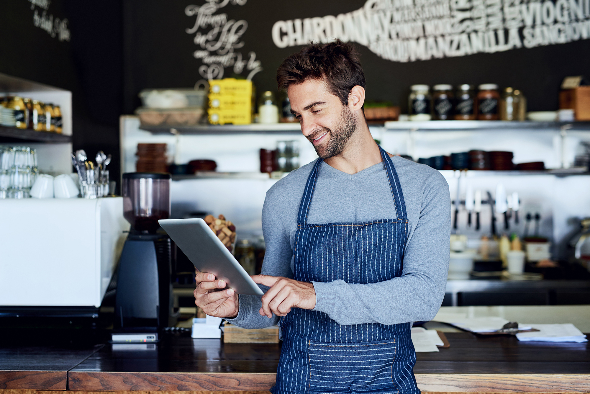 Small,Business,,Coffee,Shop,And,Man,With,Tablet,Checking,Online